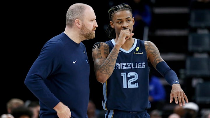 Mar 5, 2025; Memphis, Tennessee, USA; Memphis Grizzlies head coach Taylor Jenkins talks with guard Ja Morant (12) during the fourth quarter against the Oklahoma City Thunder at FedExForum. Mandatory Credit: Petre Thomas-Imagn Images Mar 5, 2025; Memphis, Tennessee, USA; Memphis Grizzlies head coach Taylor Jenkins talks with guard Ja Morant (12) during the fourth quarter against the Oklahoma City Thunder at FedExForum. Mandatory Credit: Petre Thomas-Imagn Images
