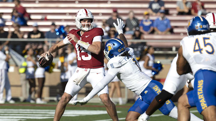 Sep 27, 2025; Stanford, California, USA;  Stanford Cardinal quarterback Ben Gulbranson (15) throws the ball during the first quarter against San Jose State Spartans linebacker Jordan Pollard (1) at Stanford Stadium. Mandatory Credit: Stan Szeto-Imagn Images

