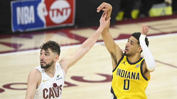 May 6, 2025; Cleveland, Ohio, USA; Cleveland Cavaliers guard Ty Jerome (2) defends Indiana Pacers guard Tyrese Haliburton (0) on a follow through for a game-winning three-point basket in the fourth quarter during game two of the second round of the 2025 NBA Playoffs at Rocket Arena. Mandatory Credit: David Richard-Imagn Images