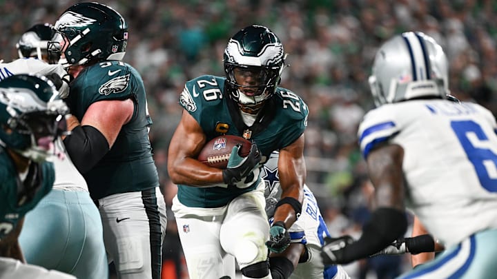 Sep 4, 2025; Philadelphia, Pennsylvania, USA; Philadelphia Eagles running back Saquon Barkley (26) carries the ball for a touchdown against the Dallas Cowboys during the second quarter of the game at Lincoln Financial Field.