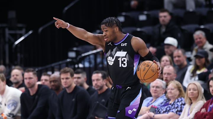 Mar 3, 2025; Salt Lake City, Utah, USA; Utah Jazz guard Isaiah Collier (13) calls a play against the Detroit Pistons during the first half at Delta Center. Mandatory Credit: Rob Gray-Imagn Images