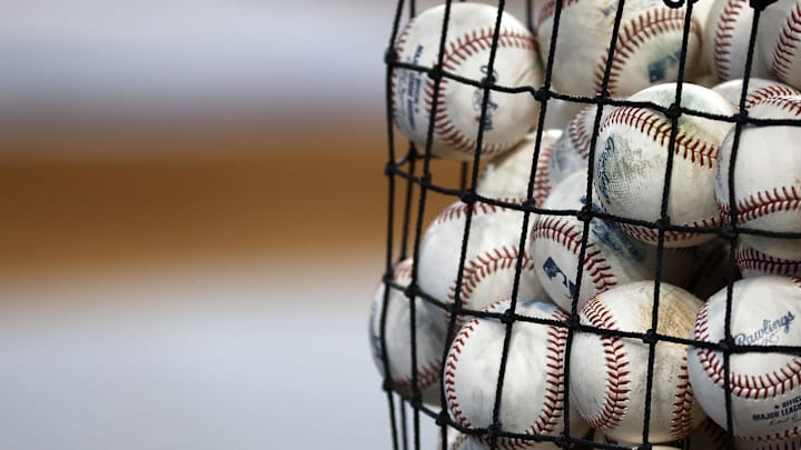 Jul 2, 2024; Miami, Florida, USA; A bucket of baseball sits on the field before the game between the Boston Red Sox and the Miami Marlins at loanDepot Park. Mandatory Credit: Rhona Wise-Imagn Images Jul 2, 2024; Miami, Florida, USA; A bucket of baseball sits on the field before the game between the Boston Red Sox and the Miami Marlins at loanDepot Park. Mandatory Credit: Rhona Wise-Imagn Images