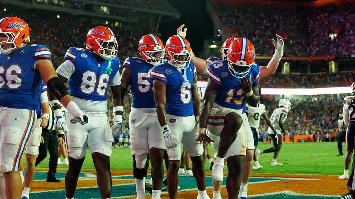Sep 5, 2026; Gainesville, Florida, USA; Florida Gators running back Jadan Baugh (13) gestures with teammates after scoring a touchdown against the Florida Atlantic Owls during the first half at Ben Hill Griffin Stadium. Mandatory Credit: Matt Pendleton-Imagn Images Sep 5, 2026; Gainesville, Florida, USA; Florida Gators running back Jadan Baugh (13) gestures with teammates after scoring a touchdown against the Florida Atlantic Owls during the first half at Ben Hill Griffin Stadium. Mandatory Credit: Matt Pendleton-Imagn Images