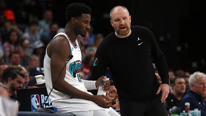 Feb 28, 2025; Memphis, Tennessee, USA; Memphis Grizzlies head coach Taylor Jenkins talks with forward Jaren Jackson Jr. (13) during the third quarter against the New York Knicks at FedExForum. Mandatory Credit: Petre Thomas-Imagn Images
