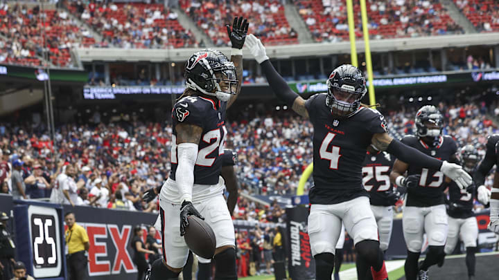 Aug 17, 2024; Houston, Texas, USA; Houston Texans cornerback Derek Stingley Jr. (24) celebrates after an interception during the first quarter against the New York Giants at NRG Stadium. Mandatory Credit: Troy Taormina-Imagn Images