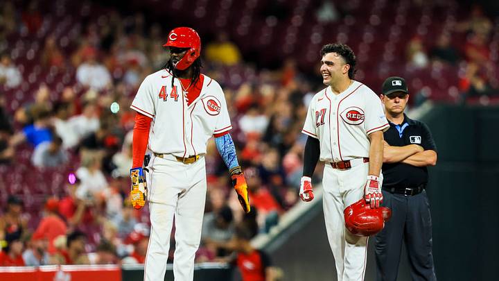 Sep 1, 2026; Cincinnati, Ohio, USA; Cincinnati Reds designated hitter Elly De La Cruz (44) and first baseman Sal Stewart (27) stand on the field during a stop in play in the eighth inning against the San Diego Padres at Great American Ball Park. Mandatory Credit: Katie Stratman-Imagn Images