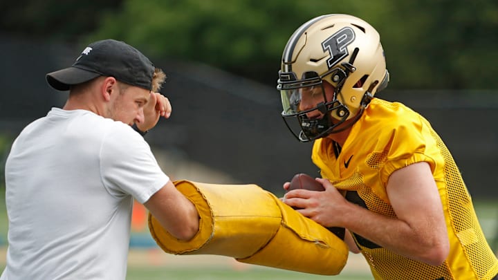 Purdue Boilermakers quarterback Carson Kitchel (20) runs a drill Wednesday, July 31, 2024, during Purdue football practice at Bimel Outdoor Practice Complex in West Lafayette, Ind.