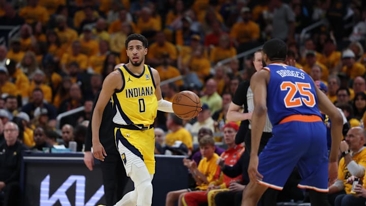 May 25, 2025; Indianapolis, Indiana, USA; Indiana Pacers guard Tyrese Haliburton (0) dribbles past New York Knicks forward Mikal Bridges (25) during the third quarter of game three of the eastern conference finals for the 2025 NBA Playoffs at Gainbridge Fieldhouse. Mandatory Credit: Trevor Ruszkowski-Imagn Images May 25, 2025; Indianapolis, Indiana, USA; Indiana Pacers guard Tyrese Haliburton (0) dribbles past New York Knicks forward Mikal Bridges (25) during the third quarter of game three of the eastern conference finals for the 2025 NBA Playoffs at Gainbridge Fieldhouse. Mandatory Credit: Trevor Ruszkowski-Imagn Images