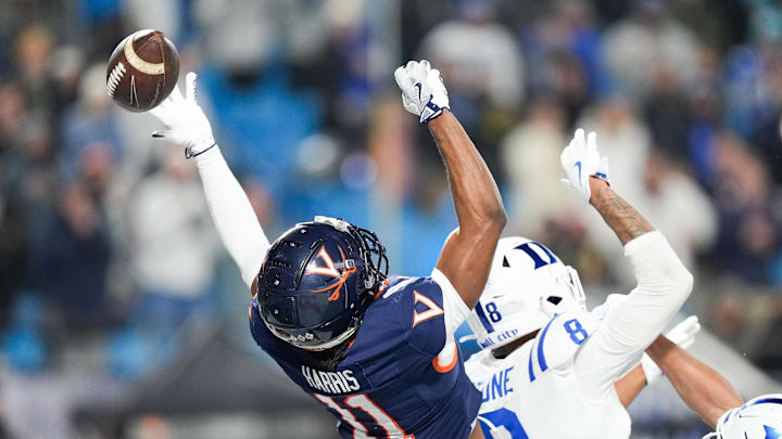 Dec 6, 2025; Charlotte, NC, USA; Virginia Cavaliers wide receiver Trell Harris (11) misses a pass in the second half against the Duke Blue Devils during the 2025 ACC Championship game at Bank of America Stadium. Mandatory Credit: Jim Dedmon-Imagn Images Dec 6, 2025; Charlotte, NC, USA; Virginia Cavaliers wide receiver Trell Harris (11) misses a pass in the second half against the Duke Blue Devils during the 2025 ACC Championship game at Bank of America Stadium. Mandatory Credit: Jim Dedmon-Imagn Images