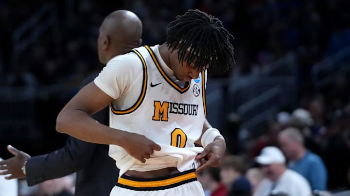 Mar 20, 2025; Wichita, KS, USA; Missouri Tigers guard Anthony Robinson II (0) reacts as he leaves the court in the second half of a first round men’s NCAA Tournament game against the Drake Bulldogs at Intrust Bank Arena. Mandatory Credit: Kirby Lee-Imagn Images