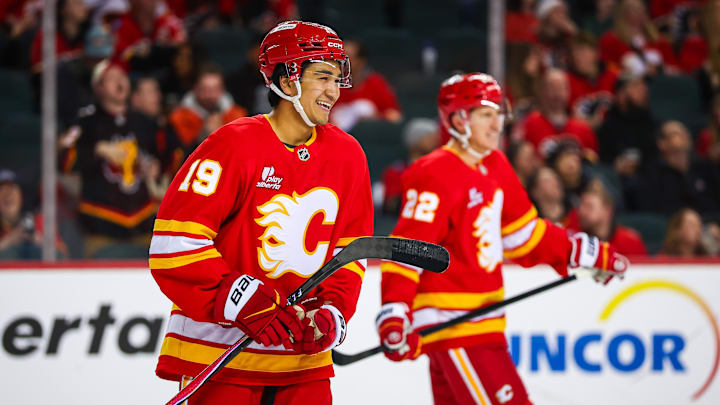 Apr 16, 2026; Calgary, Alberta, CAN; Calgary Flames defenseman Zayne Parekh (19) celebrates his goal against the Los Angeles Kings during the third period at Scotiabank Saddledome. Mandatory Credit: Sergei Belski-Imagn Images