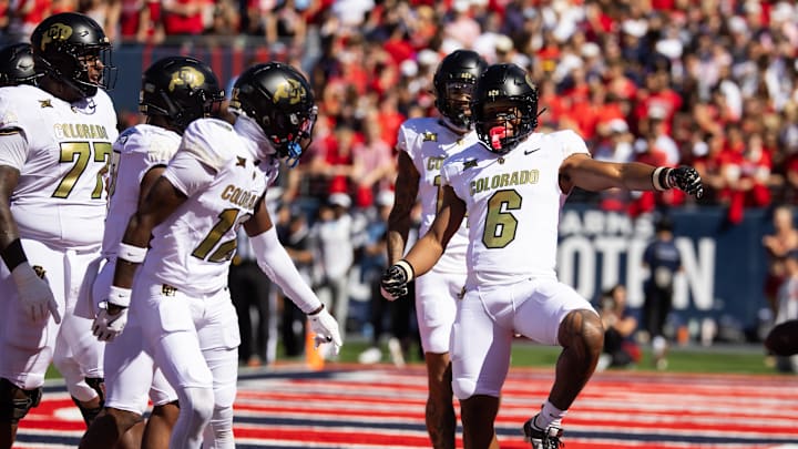 Oct 19, 2024; Tucson, Arizona, USA; Colorado Buffalos wide receiver Drelon Miller (6) celebrates after scoring a touchdown against the Arizona Wildcats in the first half at Arizona Stadium. Mandatory Credit: Mark J. Rebilas-Imagn Images