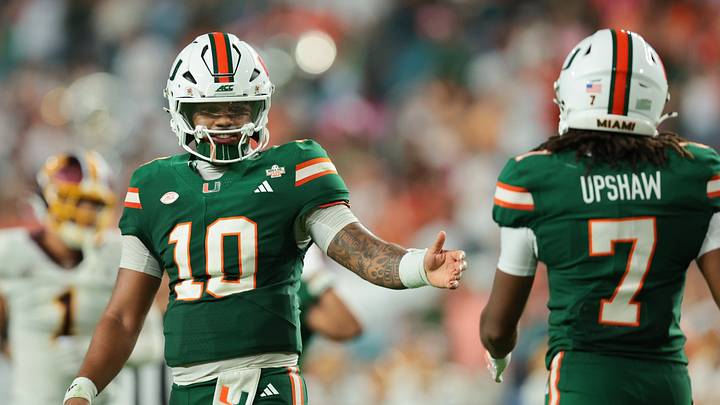 Sep 26, 2026; Miami Gardens, Florida, USA; Miami Hurricanes quarterback Darian Mensah (10) celebrates with wide receiver Daylyn Upshaw (7) against the Central Michigan Chippewas during the third quarter at Hard Rock Stadium. Mandatory Credit: Sam Navarro-Imagn Images