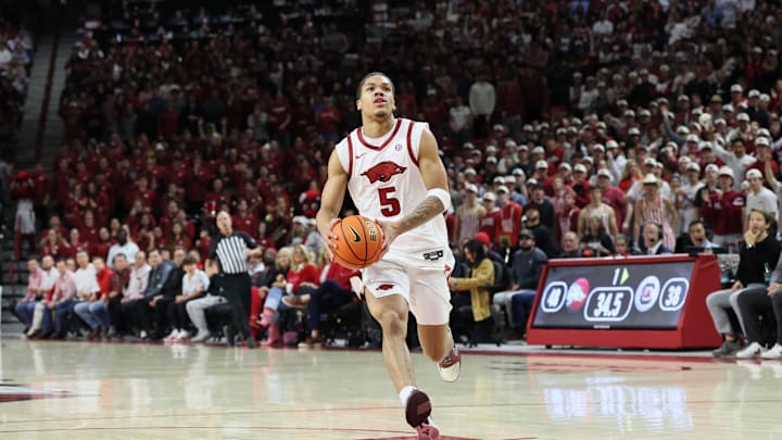 Jan 14, 2026; Fayetteville, Arkansas, USA; Arkansas Razorbacks guard Darius Acuff Jr (5) drives to the basket during the first half against the South Carolina Gamecocks at Bud Walton Arena. Arkansas won 108-74. Mandatory Credit: Nelson Chenault-Imagn Images
