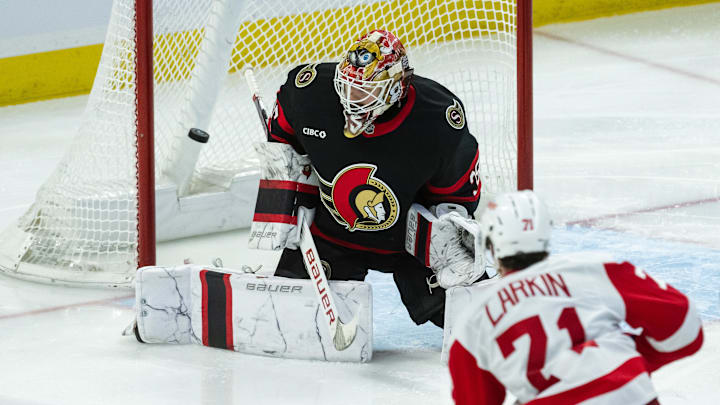 Mar 10, 2025; Ottawa, Ontario, CAN; Detroit Red Wings center Dylan Larkin (71) scores against Ottawa Senators goalie Linus Ullmark (35) in the third period at the Canadian Tire Centre. Mandatory Credit: Marc DesRosiers-Imagn Images Mar 10, 2025; Ottawa, Ontario, CAN; Detroit Red Wings center Dylan Larkin (71) scores against Ottawa Senators goalie Linus Ullmark (35) in the third period at the Canadian Tire Centre. Mandatory Credit: Marc DesRosiers-Imagn Images
