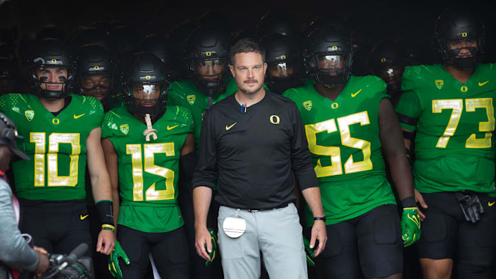 Oregon coach Dan Lanning leads his team onto the field before the game against Colorado in Eugene Saturday, Sept. 23, 2023. Oregon coach Dan Lanning leads his team onto the field before the game against Colorado in Eugene Saturday, Sept. 23, 2023.
