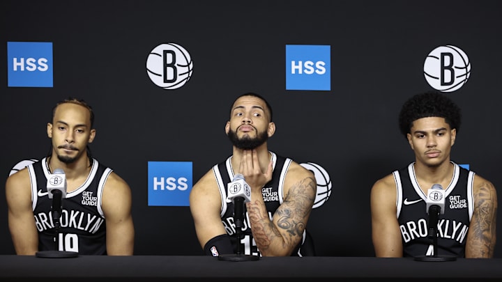 Sep 30, 2024; Brooklyn, NY, USA;  Brooklyn Nets guards Amari Bailey (19, Killian Hayes (4), and forward Tyrese Martin (13) during media day at Brooklyn Nets Media Day at HSS Training Center. Mandatory Credit: Wendell Cruz-Imagn Images