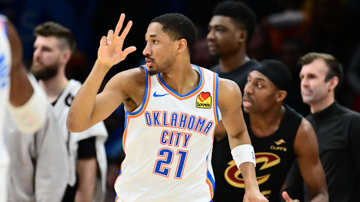Jan 19, 2026; Cleveland, Ohio, USA; Oklahoma City Thunder guard Aaron Wiggins (21) celebrates after hitting a three point basket against the Cleveland Cavaliers during the second half at Rocket Arena. Mandatory Credit: Ken Blaze-Imagn Images
