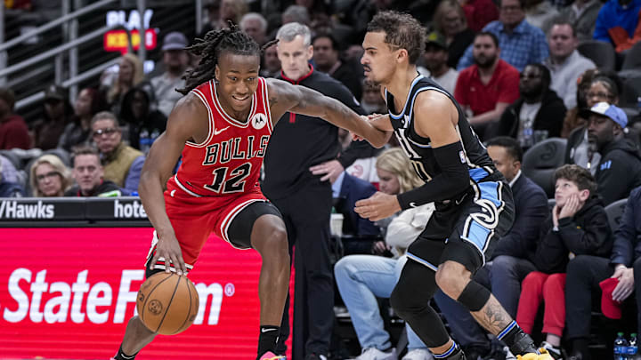Feb 12, 2024; Atlanta, Georgia, USA; Chicago Bulls guard Ayo Dosunmu (12) dribbles against Atlanta