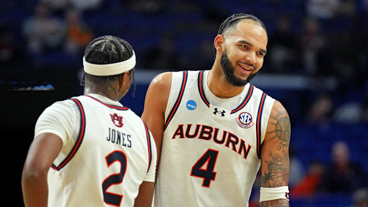 Mar 20, 2025; Lexington, KY, USA;  Auburn Tigers forward Johni Broome (4) reacts during the second half against the Alabama State Hornets in the first round of the NCAA Tournament at Rupp Arena. Mandatory Credit: Aaron Doster-Imagn Images