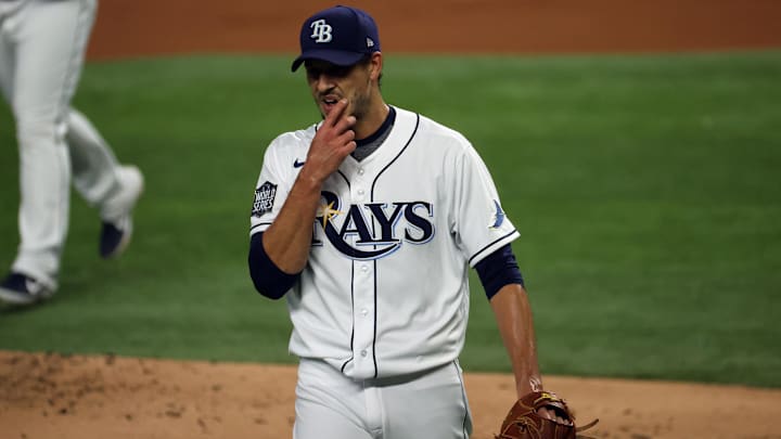 Tampa Bay Rays starting pitcher Charlie Morton (50) reacts after throwing against the Los Angeles Dodgers during the first inning of game three of the 2020 World Series at Globe Life Field in 2020.