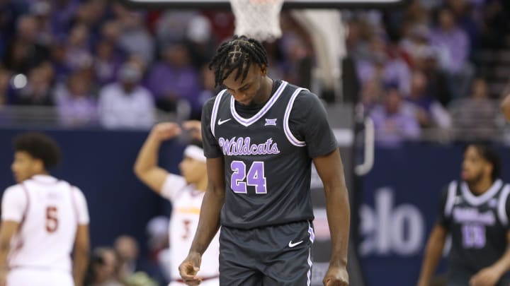 Kansas State junior forward Arthur Kaluma (24) looks down after a play in the second half of the quarterfinal round in the Big 12 Tournament inside the T-Mobile Center in Kansas City, Mo.