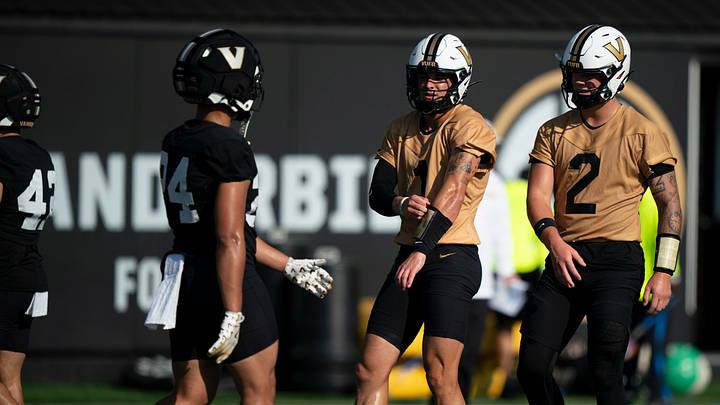 Vanderbilt quarterbacks Blaze Berlowitz (1) and Jared Curtis (2) go through drills during practice at Vanderbilt University Wednesday, Aug. 5, 2026. Vanderbilt quarterbacks Blaze Berlowitz (1) and Jared Curtis (2) go through drills during practice at Vanderbilt University Wednesday, Aug. 5, 2026.