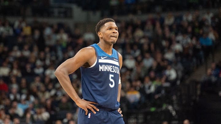 Dec 13, 2024; Minneapolis, Minnesota, USA; Minnesota Timberwolves guard Anthony Edwards (5) watches the Los Angeles Lakers shoot free throws in the second quarter at Target Center. Mandatory Credit: Matt Blewett-Imagn Images