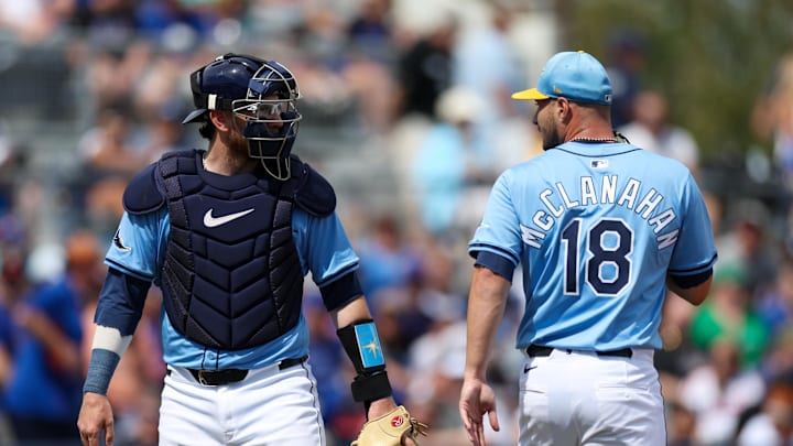 Tampa Bay Rays pitcher Shane McClanahan (18) talks to catcher Danny Jansen (19) against the New York Mets in the first inning during spring training at Charlotte Sports Park on March 1.