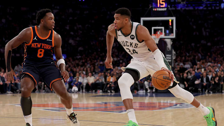 Milwaukee Bucks forward Giannis Antetokounmpo drives to the basket against New York Knicks forward OG Anunoby. Mandatory Credit: Brad Penner-Imagn Images