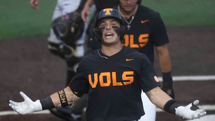 Tennessee infielder Andrew Fischer (11) celebrates after hitting his second home run of the night during a NCAA baseball game between the Tennessee Volunteers and Vanderbilt Commodores at Lindsey Nelson Stadium on May 11, 2025. Vanderbilt won 7-5 against Tennessee. Tennessee infielder Andrew Fischer (11) celebrates after hitting his second home run of the night during a NCAA baseball game between the Tennessee Volunteers and Vanderbilt Commodores at Lindsey Nelson Stadium on May 11, 2025. Vanderbilt won 7-5 against Tennessee.