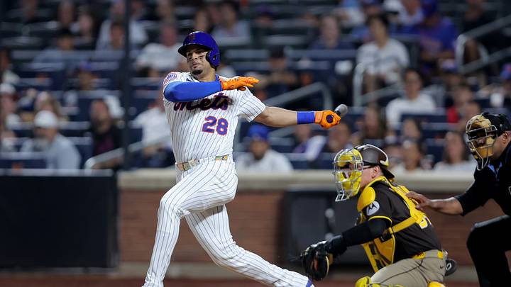 Aug 18, 2026; New York City, New York, USA; New York Mets first baseman Christopher Morel (28) follows through on a single against the San Diego Padres during the eighth inning at Citi Field. Mandatory Credit: Brad Penner-Imagn Images