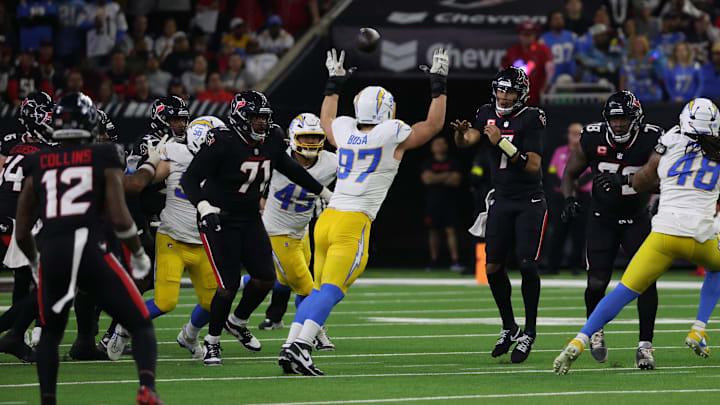 Houston Texans quarterback C.J. Stroud completes a pass to wide receiver Nico Collins against the Los Angeles Chargers.