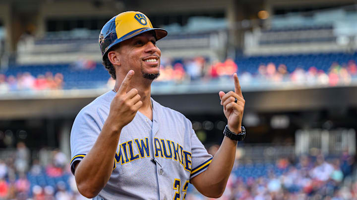 Jul 31, 2023; Washington, District of Columbia, USA; Milwaukee Brewers first base coach Quintin Berry (23) reacts to fans prior to the game between the Washington Nationals and the Milwaukee Brewers at Nationals Park. Jul 31, 2023; Washington, District of Columbia, USA; Milwaukee Brewers first base coach Quintin Berry (23) reacts to fans prior to the game between the Washington Nationals and the Milwaukee Brewers at Nationals Park.