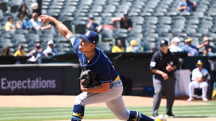 Jun 15, 2023; Oakland, California, USA; Tampa Bay Rays relief pitcher Robert Stephenson (26) pitches the ball against the Oakland Athletics during the seventh inning at Oakland-Alameda County Coliseum. Mandatory Credit: Kelley L Cox-Imagn Images
