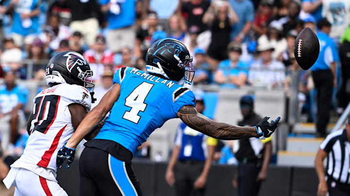  Carolina Panthers wide receiver Tetairoa McMillan (4) is unable to catch a pass in the end zone as Atlanta Falcons cornerback Dee Alford (20) defends in the third quarter at Bank of America Stadium. 