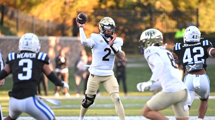 Nov 29, 2025; Durham, North Carolina, USA;  Wake Forest Demon Deacons quarter back Robby Ashford (2) throws a pass during the first quarter against the Duke Blue Devils at Wallace Wade Stadium. Mandatory Credit: Zachary Taft-Imagn Images