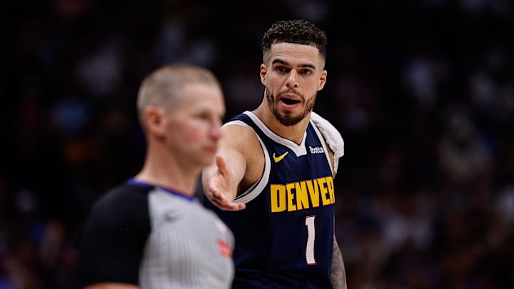 May 11, 2025; Denver, Colorado, USA; Denver Nuggets forward Michael Porter Jr. (1) gestures to referee Tyler Ford in the second quarter against the Oklahoma City Thunder during game four of the second round of the 2025 NBA Playoffs at Ball Arena. Mandatory Credit: Isaiah J. Downing-Imagn Images