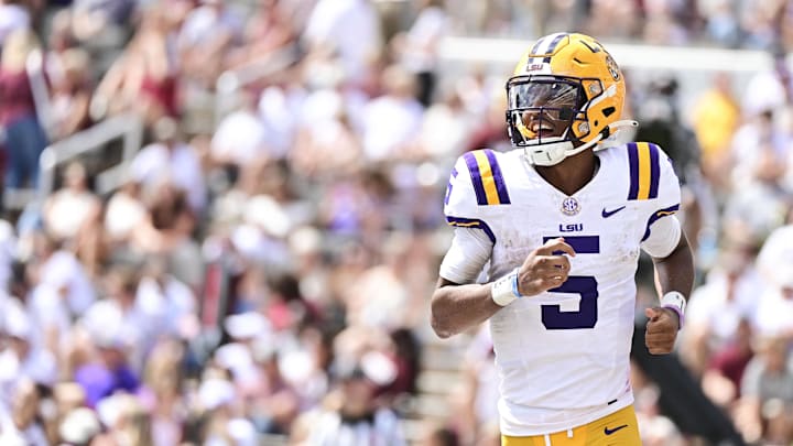 Sep 16, 2023; Starkville, Mississippi, USA; LSU Tigers quarterback Jayden Daniels (5) reacts after a