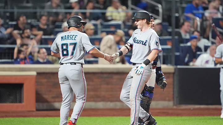 Miami Marlins center fielder Jakob Marsee (87) congratulates Miami Marlins right fielder Owen Caissie (17). Miami Marlins center fielder Jakob Marsee (87) congratulates Miami Marlins right fielder Owen Caissie (17).