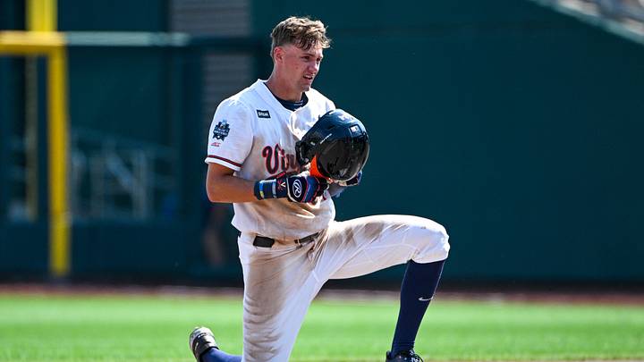 Jun 18, 2023; Omaha, NE, USA;  Virginia Cavaliers outfielder Harrison Didawick (34) steals second base against the TCU Horned Frogs in the eighth inning at Charles Schwab Field Omaha. Mandatory Credit: Steven Branscombe-Imagn Images