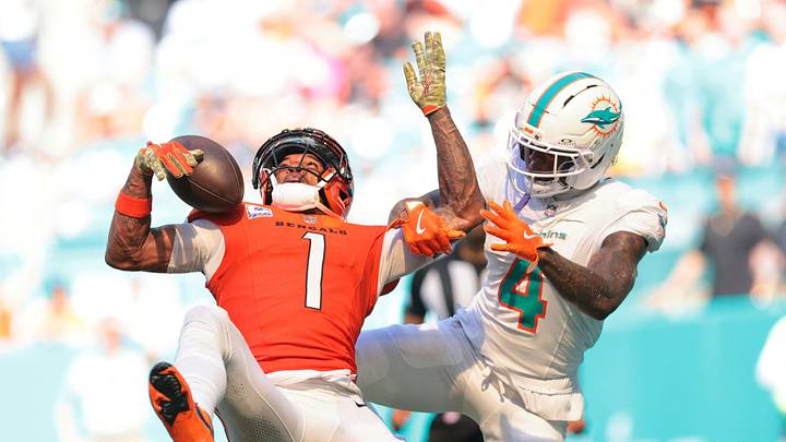Oct 11, 2026; Miami Gardens, Florida, USA; Cincinnati Bengals wide receiver Ja'Marr Chase (1) makes a catch for a touchdown in front of Miami Dolphins cornerback Jason Marshall Jr. (4) during the third quarter at Hard Rock Stadium. Mandatory Credit: Sam Navarro-Imagn Images Oct 11, 2026; Miami Gardens, Florida, USA; Cincinnati Bengals wide receiver Ja'Marr Chase (1) makes a catch for a touchdown in front of Miami Dolphins cornerback Jason Marshall Jr. (4) during the third quarter at Hard Rock Stadium. Mandatory Credit: Sam Navarro-Imagn Images