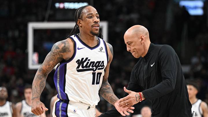 Apr 1, 2026; Toronto, Ontario, CAN; Sacramento Kings forward DeMar DeRozan (10) slaps hands with head coach Doug Christie after making a three-point basket against the Toronto Raptors in the second half at Scotiabank Arena. Apr 1, 2026; Toronto, Ontario, CAN; Sacramento Kings forward DeMar DeRozan (10) slaps hands with head coach Doug Christie after making a three-point basket against the Toronto Raptors in the second half at Scotiabank Arena.