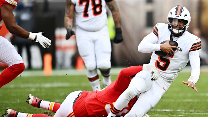 Dec 15, 2024; Cleveland, Ohio, USA; Kansas City Chiefs defensive end George Karlaftis (56) tackles Cleveland Browns quarterback Jameis Winston (5) during the first quarter at Huntington Bank Field. Mandatory Credit: Ken Blaze-Imagn Images