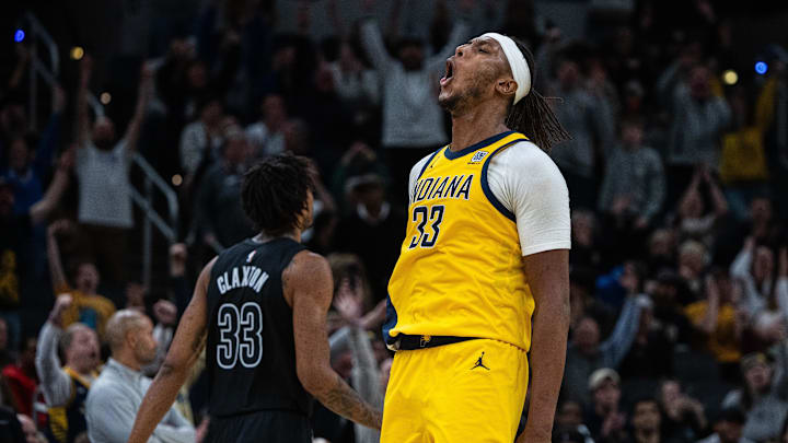 Mar 20, 2025; Indianapolis, Indiana, USA; Indiana Pacers center Myles Turner (33) celebrates a basket in the game against the Brooklyn Nets at Gainbridge Fieldhouse. Mandatory Credit: Trevor Ruszkowski-Imagn Images