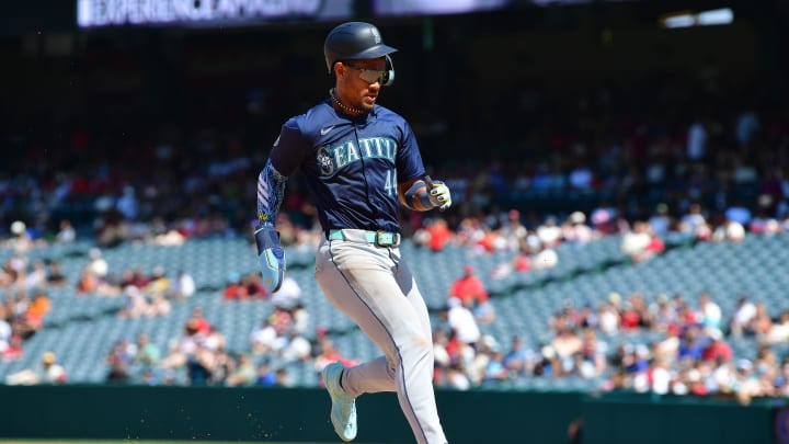 Seattle Mariners center fielder Julio Rodriguez (44) reaches third against the Los Angeles Angels during the eighth inning at Angel Stadium on July 14. Seattle Mariners center fielder Julio Rodriguez (44) reaches third against the Los Angeles Angels during the eighth inning at Angel Stadium on July 14.