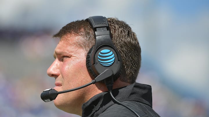 Sep 15, 2018; Lawrence, KS, USA; Rutgers Scarlet Knights head coach Chris Ash watches game action during the first half against the Kansas Jayhawks at Memorial Stadium. Mandatory Credit: Denny Medley-Imagn Images Sep 15, 2018; Lawrence, KS, USA; Rutgers Scarlet Knights head coach Chris Ash watches game action during the first half against the Kansas Jayhawks at Memorial Stadium. Mandatory Credit: Denny Medley-Imagn Images