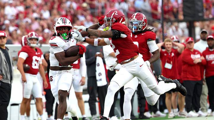 Sep 26, 2026; Tuscaloosa, Alabama, USA;  South Carolina Gamecocks running back Matt Fuller (28) is pushed out of bounds by Alabama Crimson Tide defensive back Zabien Brown (2) during the first quarter at Saban Field at Bryant-Denny Stadium.  Mandatory Credit: David Leong-Imagn Images