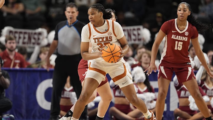 Mar 6, 2026; Greenville, SC, USA; Texas Longhorns forward Madison Booker (35) looks to pass against the Alabama Crimson Tide during the first half at Bon Secours Wellness Arena. Mandatory Credit: Jim Dedmon-Imagn Images