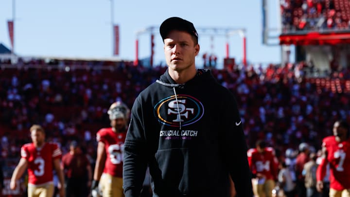 Sep 29, 2024; Santa Clara, California, USA; San Francisco 49ers running back Christian McCaffrey (23) walks off the field after the game against the New England Patriots at Levi's Stadium. Mandatory Credit: Sergio Estrada-Imagn Images